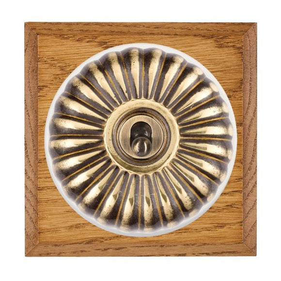 Hamilton BCMFT21AB-W Bloomsbury Chamfered Medium Oak 1 gang 20AX 2 Way Toggle Antique Brass Fluted Dome/White Collar Insert